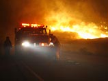 Губернатор Шварценеггер: в Калифорнии под контроль взяты более половины пожаров