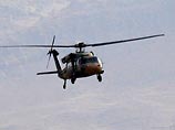 Вертолеты сбрасывают бомбы на позиции боевиков на востоке страны, в гористых районах провинции Сирнах. 