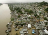 Количество жертв наводнений, вызванных в Доминиканской республике и на Гаити ливнями, которые принес тропический шторм "Ноэль", превысило 80 человек