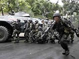 Чрезвычайная обстановка складывается в эти часы в столице Филиппин. Силы безопасности начали штурм отеля Peninsula в центре Манилы, чтобы арестовать около 30 мятежных военных, потребовавших отставки президента Глории Макапагал Арройо