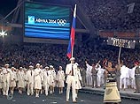 Александр Попов нес российское знамя в 2004 году на Олимпиаде в Афинах