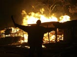 До пятидесяти человек погибли во вторник в результате поджога церкви в городе Элдорет на западе Кении До пятидесяти человек погибли во вторник в результате поджога церкви в городе Элдорет на западе Кении