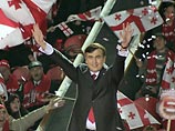 Михаил Саакашвили празднует победу на выборах президента Грузии и говорит о "тройном успехе"