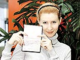 Российской гимнастке придется менять паспорт из-за автографа Путина Российской гимнастке придется менять паспорт из-за автографа Путина