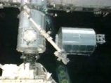 Члены экипажа шаттла Atlantis не уложились в график в открытом космосе