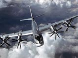 Два российских Ту-95МС в субботу приблизились к авианосцу ВМС США "Нимиц", а один даже пролетел над его палубой Два российских Ту-95МС в субботу приблизились к авианосцу ВМС США "Нимиц", а один даже пролетел над его палубой
