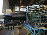 Новейший атомный подводный крейсер "Юрий Долгорукий" спущен на воду из плавучего дока северодвинского ФГУП "ПО "Севмашпредприятие" Новейший атомный подводный крейсер "Юрий Долгорукий" спущен на воду из плавучего дока северодвинского ФГУП "ПО "Севмашпредприятие"