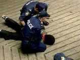 В Сиднее полиция разогнала митинг в поддержку тибетских демонстрантов В Сиднее полиция разогнала митинг в поддержку тибетских демонстрантов
