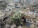 Ранее местные власти провинции Сычуань, наиболее пострадавшей от землетрясения, объявили, что жертвами землетрясения стали 19 509 человек