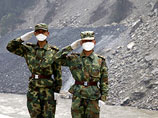 На месте завалов работают тысячи китайских военных 