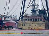 Судебные власти Гонконга наложили арест крупнейший в Азии китайский плавучий кран "Хуа тянь лун", который был задействован для поднятия со дна моря затонувшего украинского судна "Нефтегаз-67"