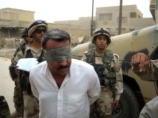Американская армия передала иракским властям восьмерых функционеров баасистского режима