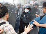 Кабинет министров Кореи подал в отставку из-за американской говядины Кабинет министров Кореи подал в отставку из-за американской говядины