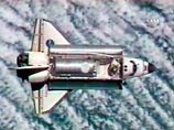 Шаттл Discovery возвращается на Землю Шаттл Discovery возвращается на Землю