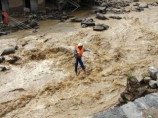 Вызванные ливнями наводнения в Китае унесли жизни 169 человек