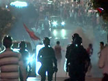 Столкновения хорватских болельщиков с полицией в Боснии - фанатов успокоили с помощью слезоточивого газа и бронетехники