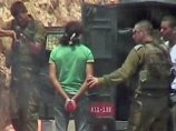 Спутниковый телеканал "Аль-Джазира" показал видеозапись расправы израильских солдат над палестинцем