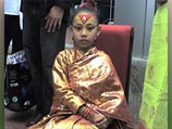 Богиней становится девочка, не достигшая половой зрелости, выбираемая из народа неваров, населяющего долины Катманду. На фото - Саджари Шакья, Кумари города Бхактапура