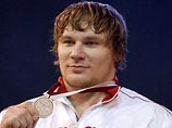 Российский штангист Евгений Чигишев упустил "золото" в последней попытке Российский штангист Евгений Чигишев упустил "золото" в последней попытке