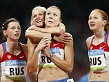 Женская сборная России выиграла олимпийскую эстафету на 4х100 метров Женская сборная России выиграла олимпийскую эстафету на 4х100 метров