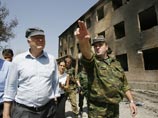 Комиссар Совета Европы по правам человека Томас Хамарберг привез из Цхинвали в грузинское село Каралети близ Гори на пост российских миротворческих сил семерых грузинских пленных, а грузинская сторона передала пятерых пленных Комиссар Совета Европы по правам человека Томас Хамарберг привез из Цхинвали в грузинское село Каралети близ Гори на пост российских миротворческих сил семерых грузинских пленных, а грузинская сторона передала пятерых пленных