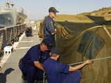 Как сообщали грузинские СМИ, американский корабль утром в среду ждали в порту Поти, где готовились к торжественной встрече, однако в последний момент решение о порте причаливания было изменено Как сообщали грузинские СМИ, американский корабль утром в среду ждали в порту Поти, где готовились к торжественной встрече, однако в последний момент решение о порте причаливания было изменено