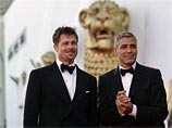 Исполнители главных ролей в картине "Сжечь после прочтения" Бред Питт и Джордж Клуни торжественно прошли по красной дорожке 65-го Международного кинофестиваля