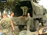 Корреспондент Reuters заявляет, что солдаты на бронетранспортерах покидают свои посты на окраинах Поти