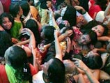При традиционной для Рамадана раздаче милостыни в Индонезии погибли более 20 бедняков