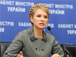 Тимошенко призвала президента "опомниться" и не толкать страну на досрочные выборы