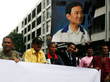 Приговор был вынесен заочно - в слушаниях политик не участвовал. Два месяца назад 59-летний Таксин бежал в Великобританию вместе со своей супругой - 51-летней Почаман Чинават