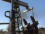 Нефтяные котировки на азиатских торгах в четверг снизились до 22-месячного минимума ниже 55 долларов за баррель
