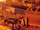 Китайские спасатели ищут 17 пропавших без вести при обрушении туннеля Китайские спасатели ищут 17 пропавших без вести при обрушении туннеля