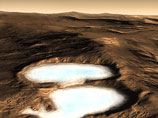 Радар, установленный на орбитальном зонде, обнаружил в средних широтах Марса ледники толщиной сотни метров, скрытые слоем наносных пород