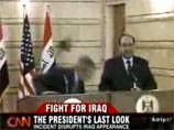 Выступление президента США было прервано одним из журналистов, который швырнул в выступавшего ботинок, крикнув на арабском языке "Это подарок от иракцев. Это прощальный поцелуй, ты - собака"