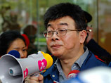 Сторонник экс-президента Тайваня сорвал парик с парламентария, возразившего против его освобождения 