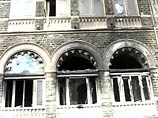 Построенное 105 лет назад великолепное здание, напоминающее дворец очень сильно пострадало от вспыхнувшего во время нападения пожара Построенное 105 лет назад великолепное здание, напоминающее дворец очень сильно пострадало от вспыхнувшего во время нападения пожара