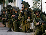 Израильская армия отправила повестки нескольким тысячам резервистов для участия и обеспечения операции в секторе Газа под кодовым названием "Литой свинец"