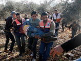 Число палестинцев, погибших за две недели израильской операции в секторе Газа, превысило 800 человек
