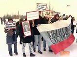 В Санкт-Петербурге прошел "Марш согласных". Мероприятие с вроде бы проправительственными лозунгами вылилось в "Марш абсурда" и было прекращено милицией, заметившей триколор с лозунгом "Мы согласны на все" и "лики" Путина в образе православного святого В Санкт-Петербурге прошел "Марш согласных". Мероприятие с вроде бы проправительственными лозунгами вылилось в "Марш абсурда" и было прекращено милицией, заметившей триколор с лозунгом "Мы согласны на все" и "лики" Путина в образе православного святого
