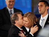 Центристская партия "Кадима" под председательством главы МИДа Ципи Ливни набирает 28 мандатов (22%)