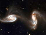 Новые данные обсерватории Апачи-Пойнт в штате Нью-Мексико подтвердили более ранние предположения ученых о том, что черные дыры, "танцующие" вокруг друг друга, свидетельствуют об изменении направления движения галактики