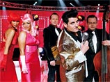 Бельгийский фан-клуб Элвиса Пресли требует исключить Бельгию из списка участников "Евровидения-2009" в связи с тем, что представлять страну на конкурсе доверено певцу Патрику Ушенсу, который собирается выступить в образе Элвиса Пресли