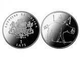 Латвийский ЦБ выпустил "счастливые" монеты с изображением свиньи

