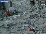 Местные жители вызволили из-под обломков здания 13 трупов и восьмерых раненых, среди которых, по данным источника агентства, есть мирные жители и иностранцы