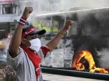 Участники массовых антиправительственных акций в Таиланде подожгли здание Министерства образования. Участники массовых антиправительственных акций в Таиланде подожгли здание Министерства образования.