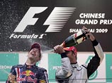 Немецкий гонщик команды "Ред Булл" Себастьян Феттель стал победителем третьей гонки формулического сезона - Гран-при Китая