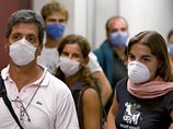 Свиной грипп заставит австралийских пловцов совершать перелеты в масках 