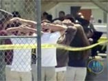 В США 15-летний юноша не смог устроить бойню: он выстрелил мимо учительницы, а потом в себя В США 15-летний юноша не смог устроить бойню: он выстрелил мимо учительницы, а потом в себя