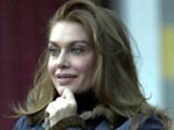 Берлускони требует запретить публикацию фото, сделанных на его вилле Берлускони требует запретить публикацию фото, сделанных на его вилле